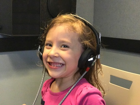 Girl getting a hearing test