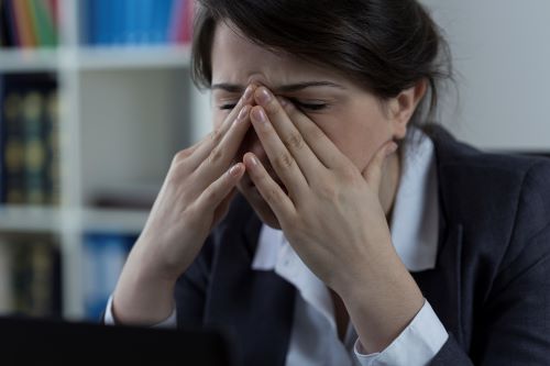 Woman with sinus pain